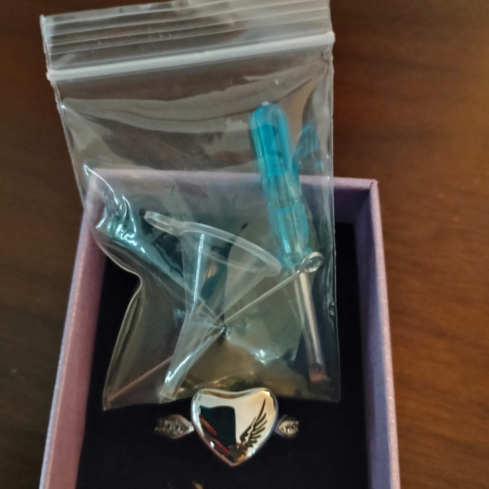 Silver Heart Ring with Wing Accents Size 9